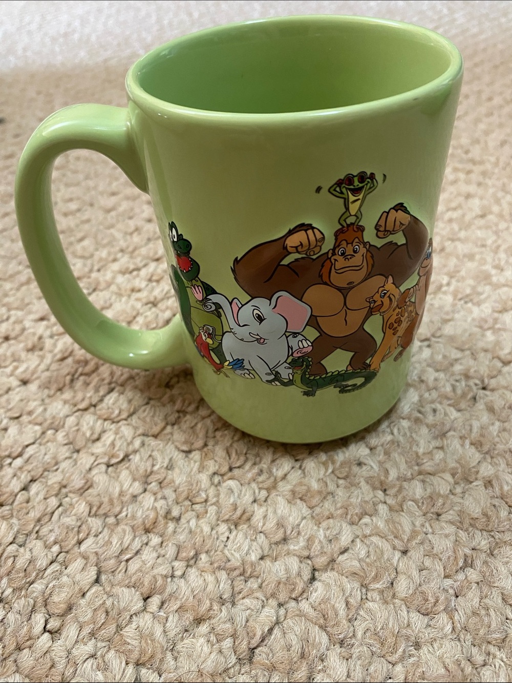 Rainforest cafe mint green coffee mug, with 3D animals